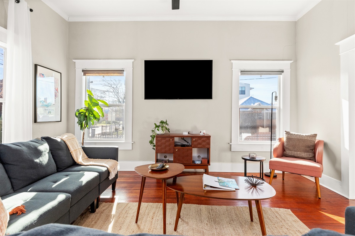 A symphony of textures and hues, this living room is a canvas of comfort, inviting you to unwind and embrace the beauty of home