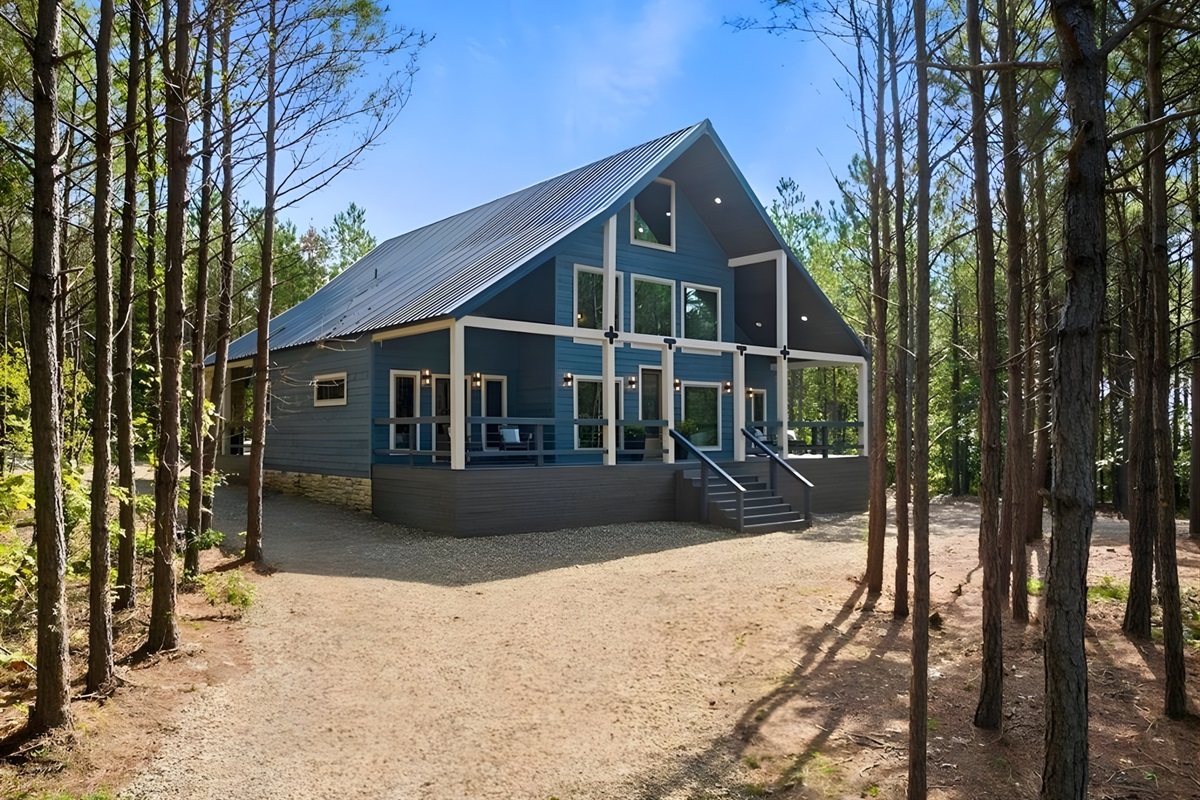 Pulling into the driveway, you’re welcomed by a charming exterior that instantly feels warm and inviting.