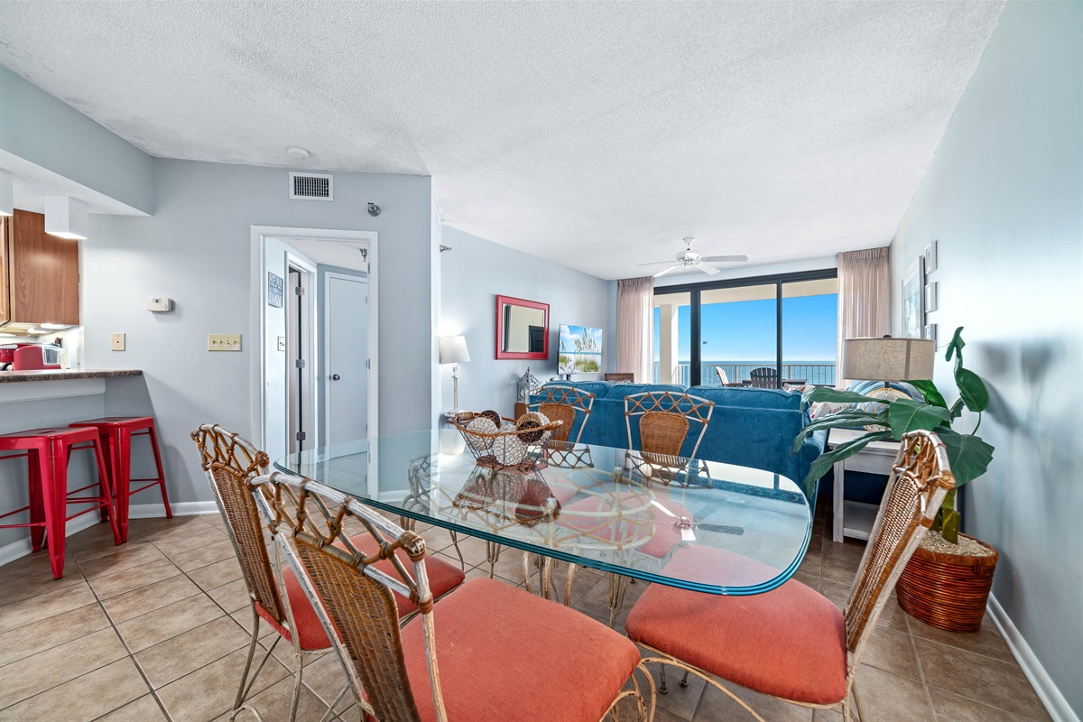 Flexible dining options for every occasion. Enjoy a formal meal at the dining table or a casual snack at the breakfast bar, seamlessly connected to the fully equipped kitchen.