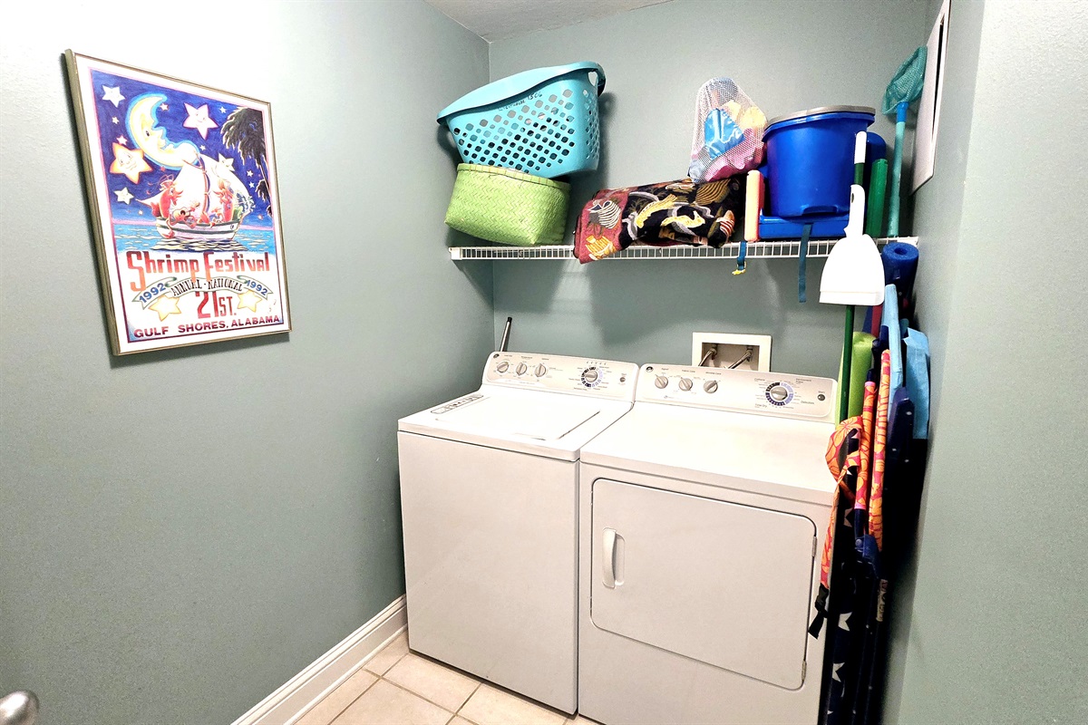 Laundry room with full size washer and dryer