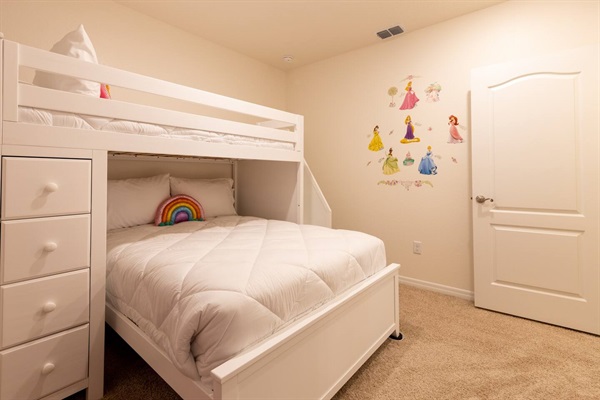 Upstairs Princess Themed Girl's Room with Twin Bunk Bed,  Lower Double Bed and Tea Party Table Set. Luggage rack & laundry basket in closet.