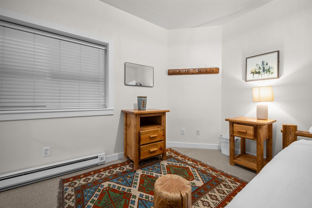Secondary bedroom with cozy furnishings—perfect for additional guests.