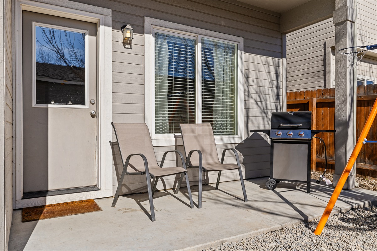 Closeup of the patio chairs and BBQ station.
