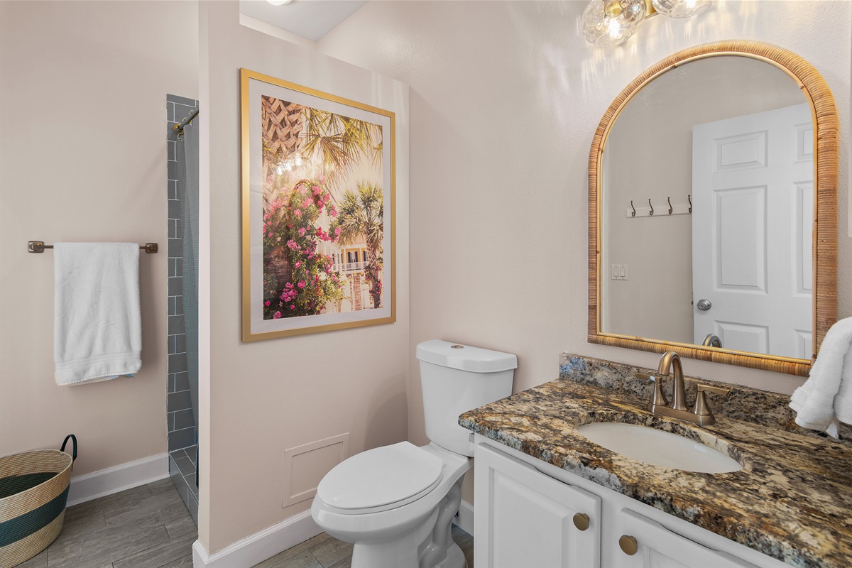 Full bathroom on level 1 with a remodeled, walk in shower!