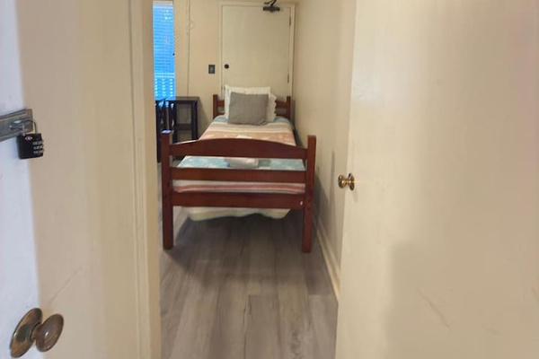 Twin bed by the door