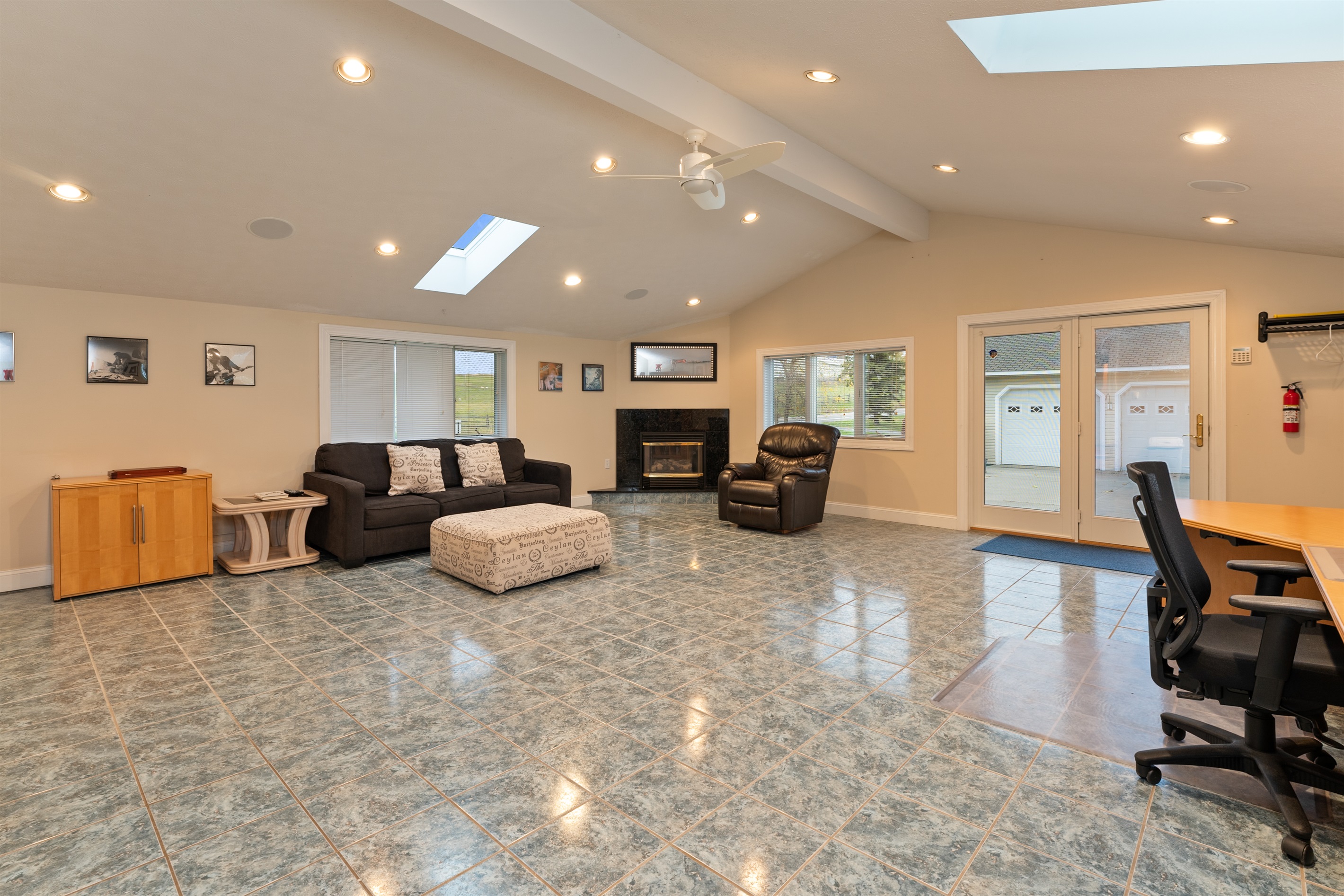 Designated desk area with separate living room space-main floor