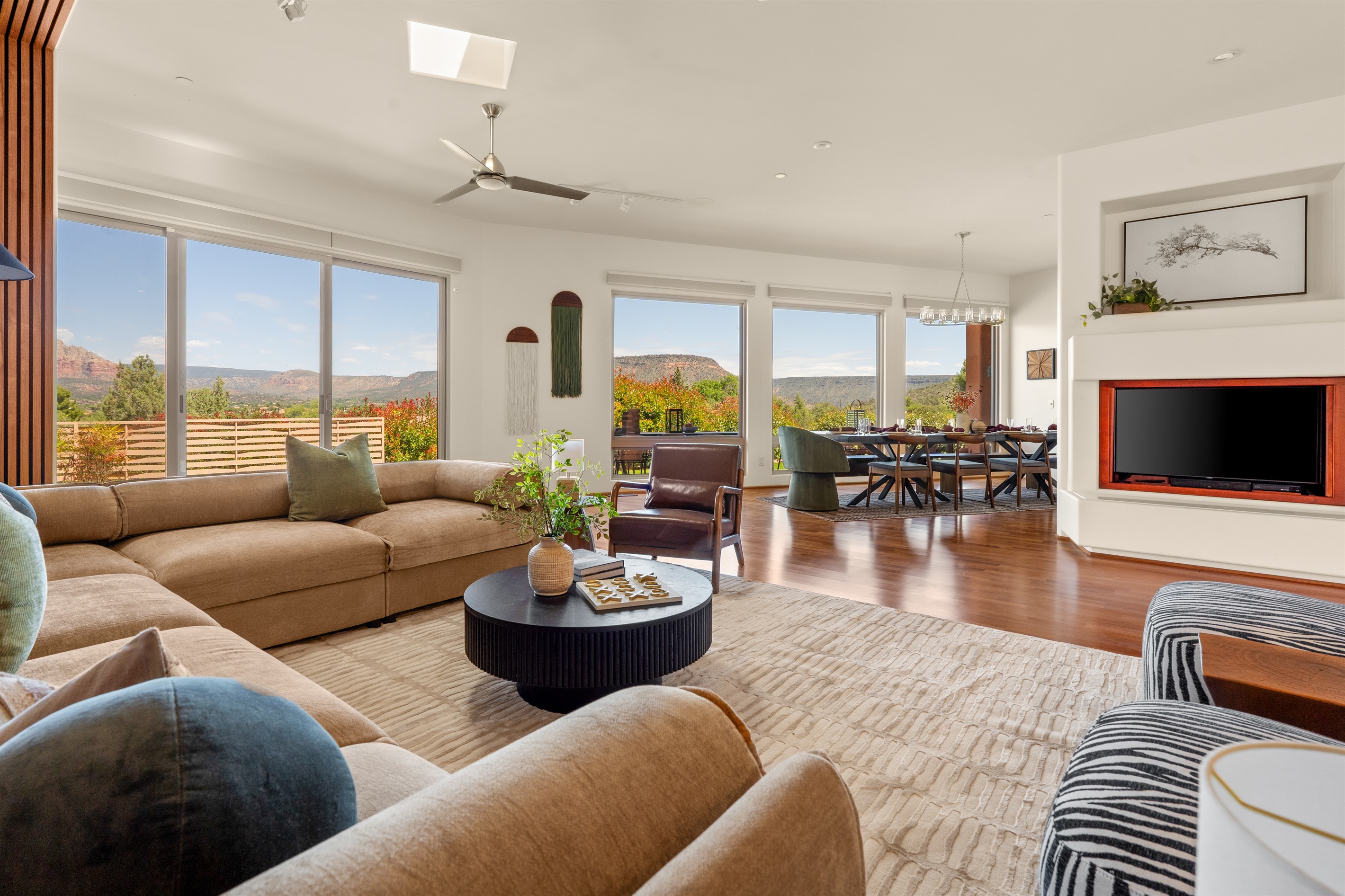 Bring the outside in. Relax in the main living lounge where wall-to-wall glass doors provide uninterrupted, panoramic views of the red rocks from the comfort of the sofa