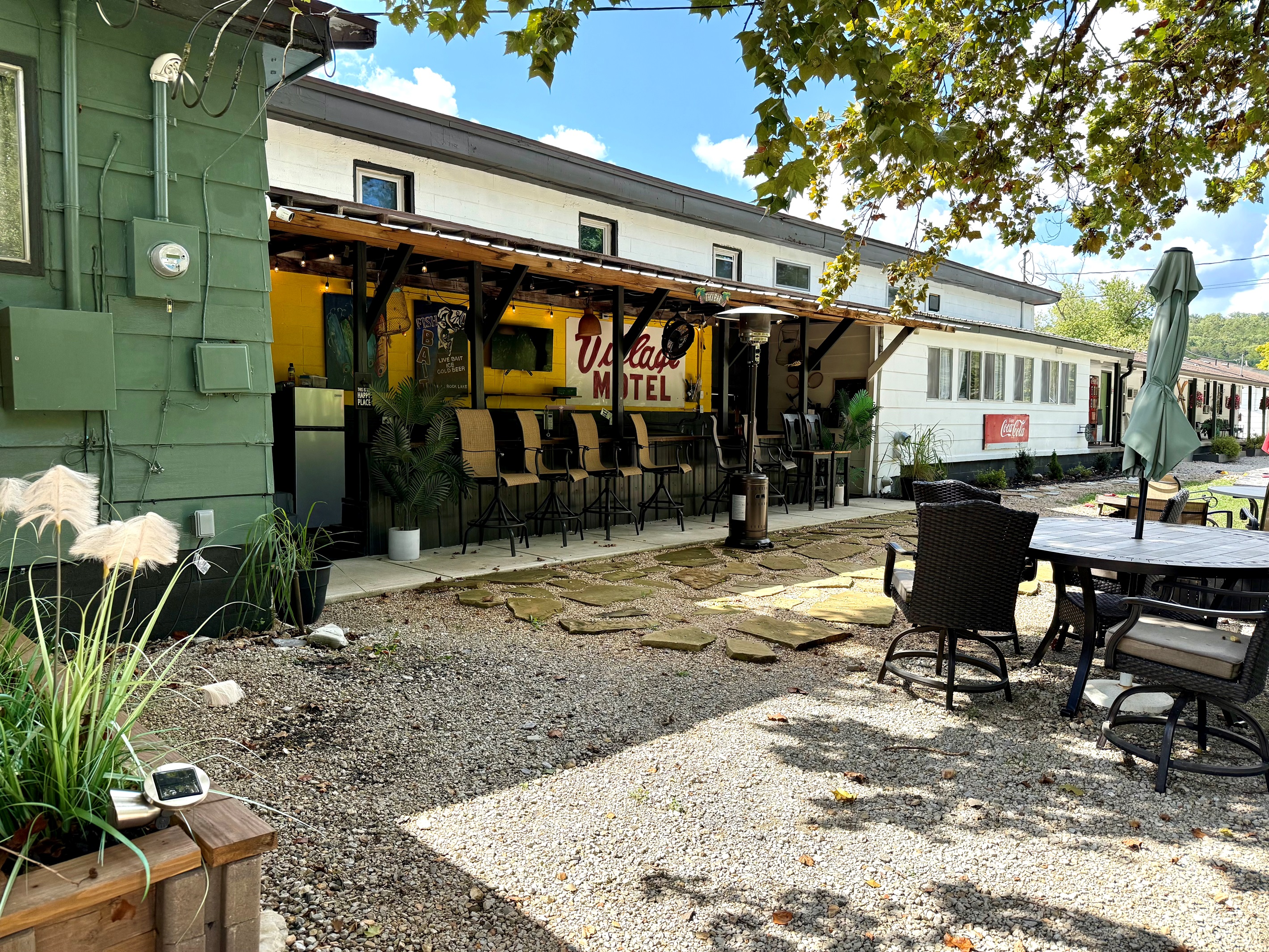 Outdoor grill area with plenty of seating.