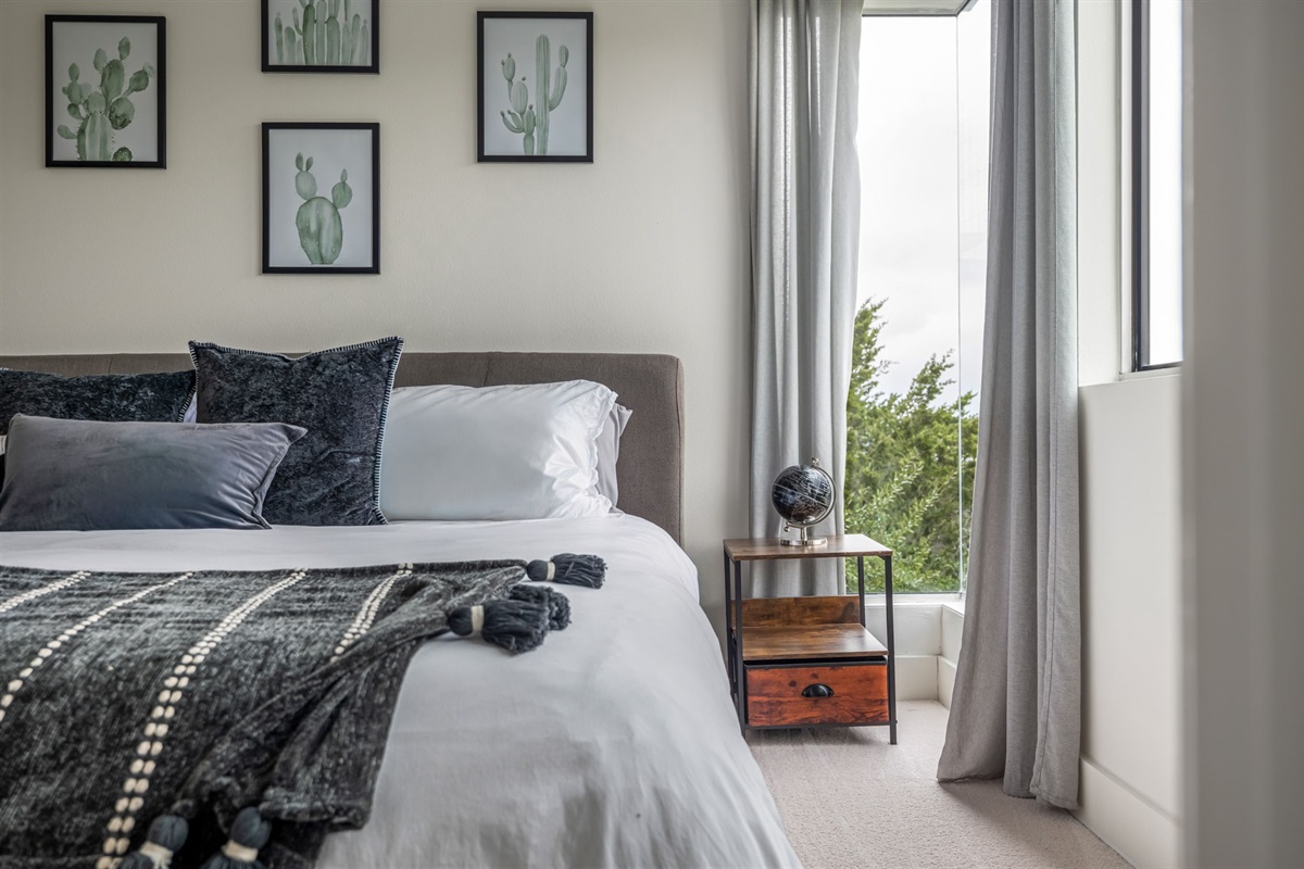 Cozy bedroom with soft linens and natural light