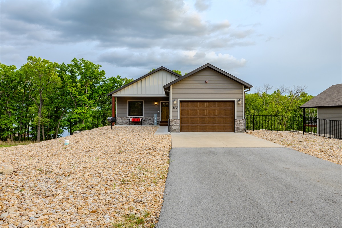 Front exterior with spacious parking area