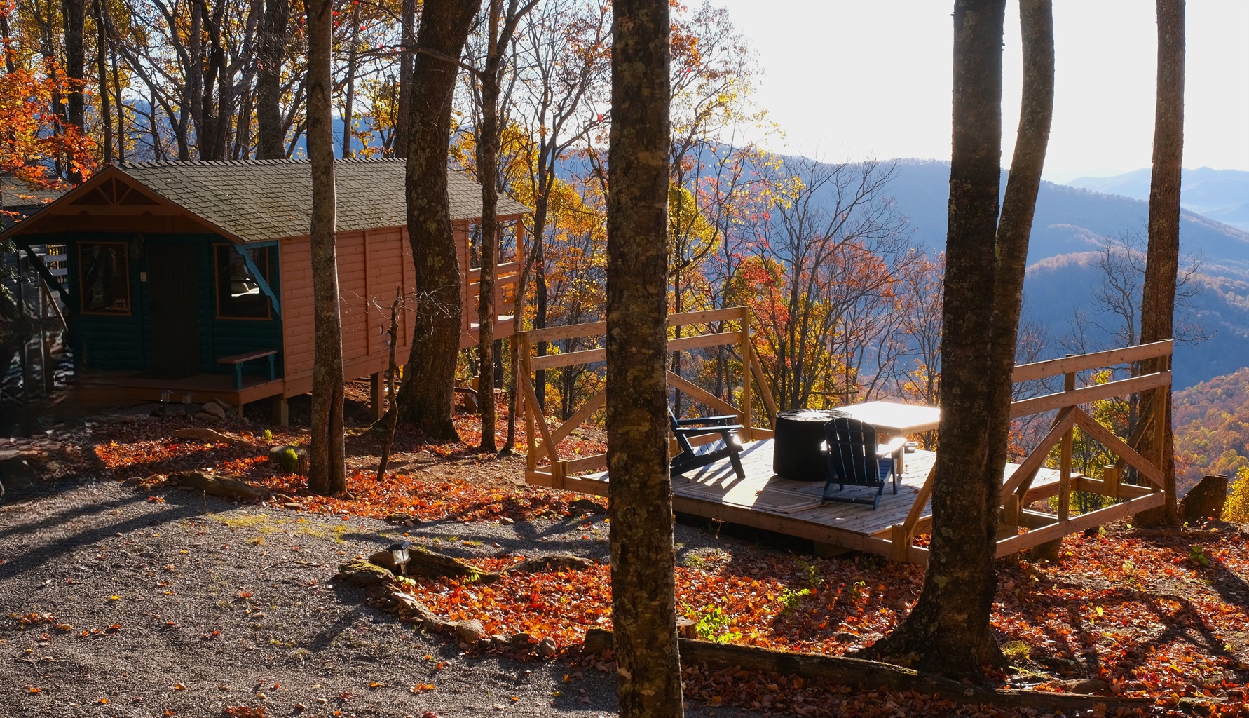 Deck next to the Cabin with gas Firepit Table
