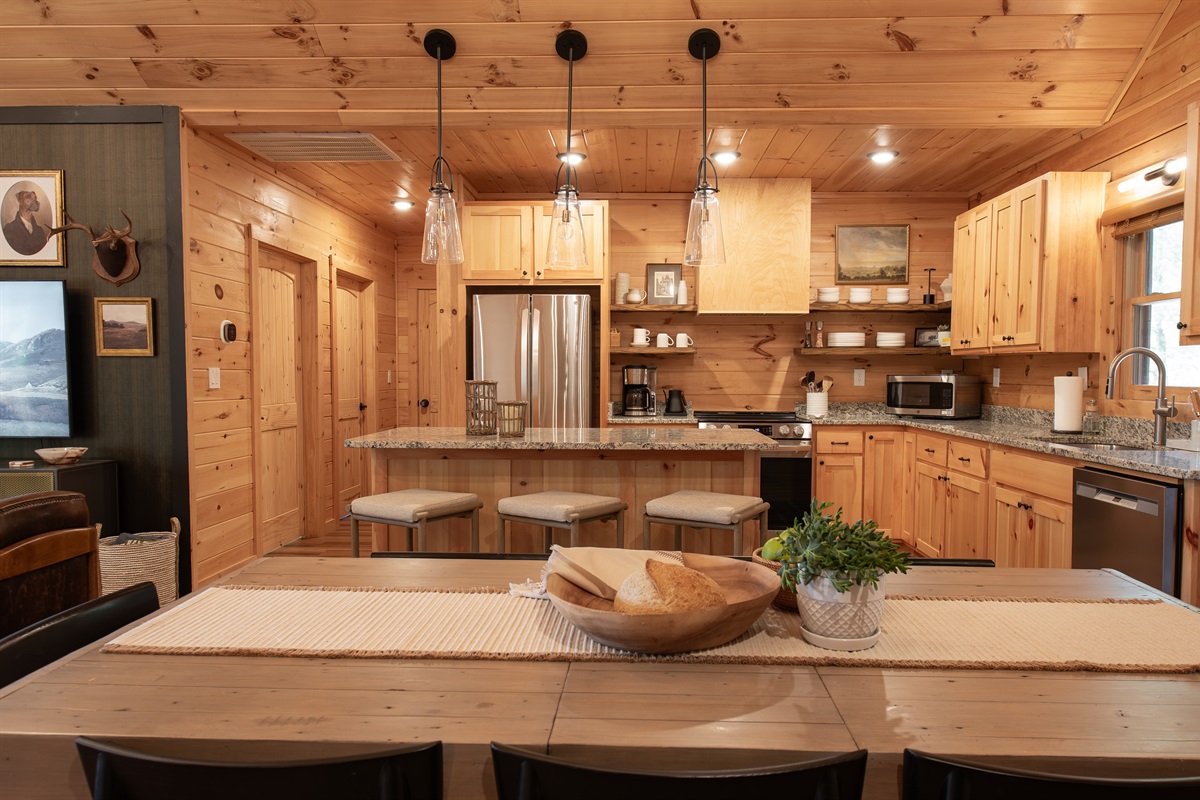 With barstools and ample counter space, the kitchen is perfect for everything from quick breakfasts to big family dinners.