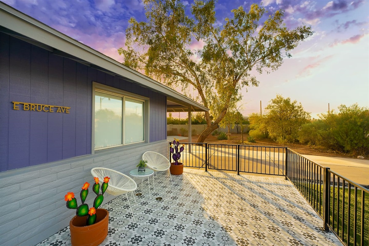 Gorgeous tiled front porch sitting area