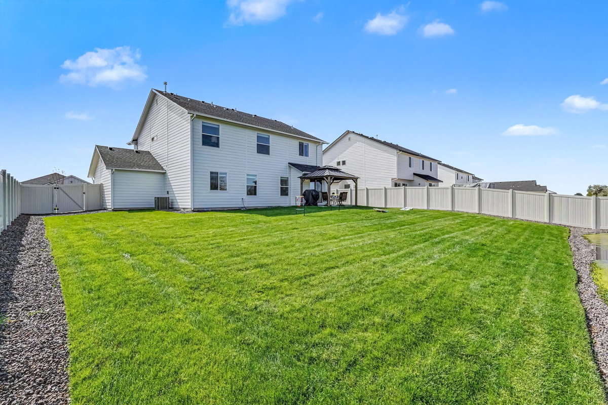 Just look at this backyard. So much space for yard games or hosting family BBQs.