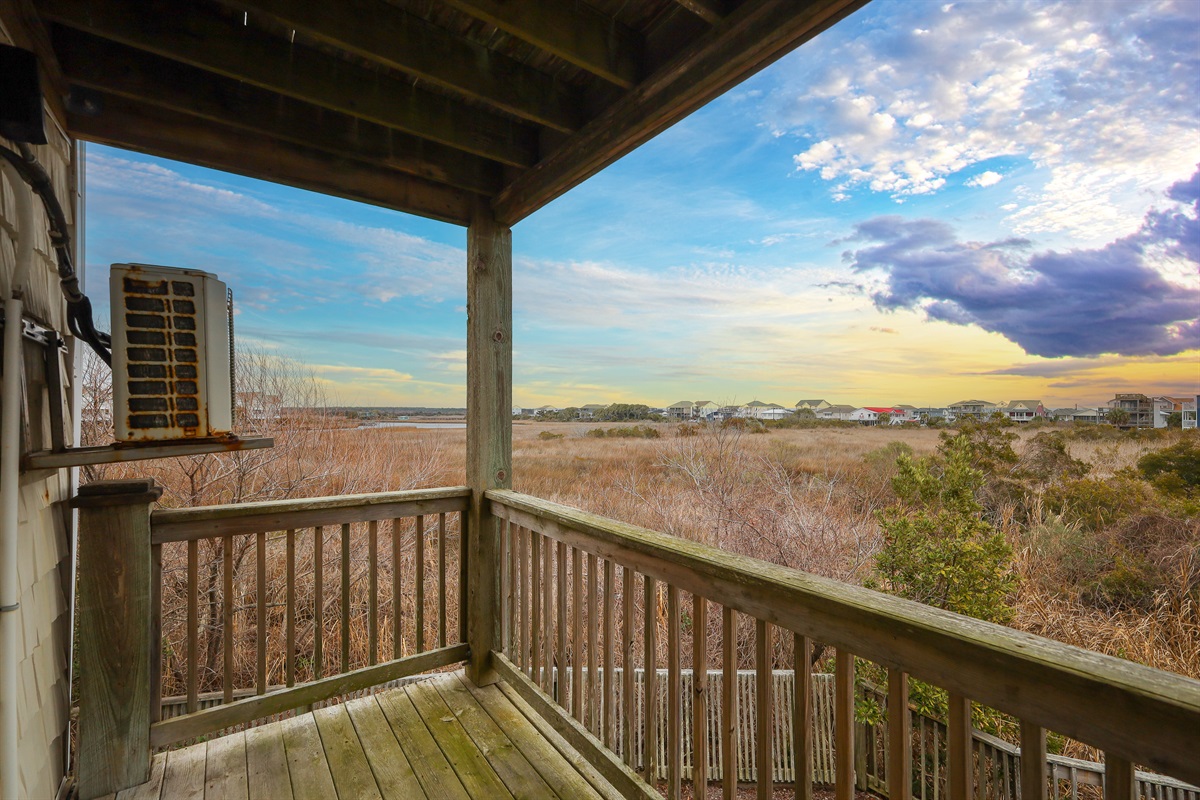 Private balcony overlooking the Intracoastal Waterway&mdash;an ideal spot to enjoy peaceful marsh views and colorful coastal sunsets