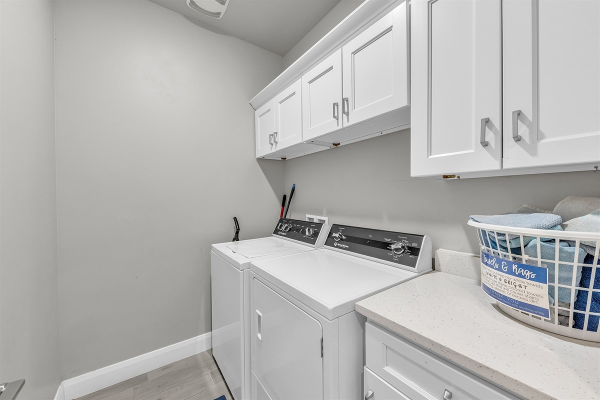 Laundry room with washer, dryer & folding counter