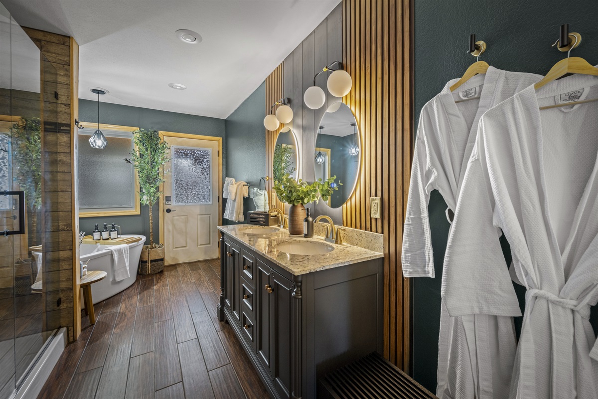 Main floor: Refresh in the spacious walk-in shower and a soaking tub of the en-suite bathroom