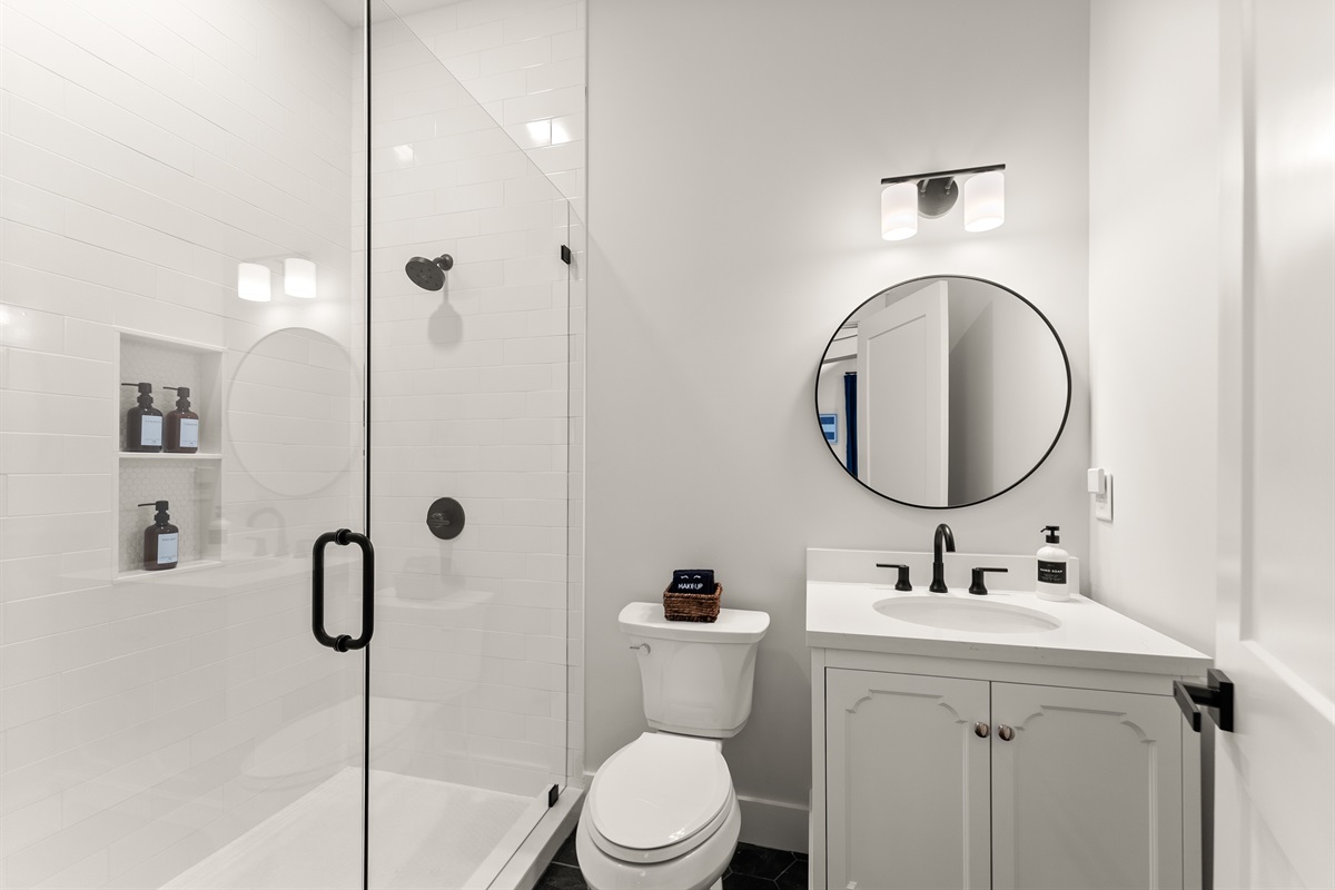 Sleek guest bath with walk-in shower.