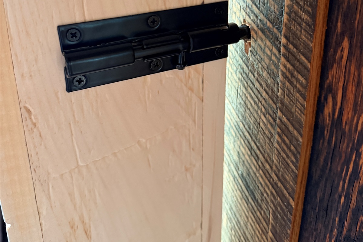 A secure interior latch allows guests to lock the sliding barn door from inside the tent, adding extra privacy and security throughout your stay.