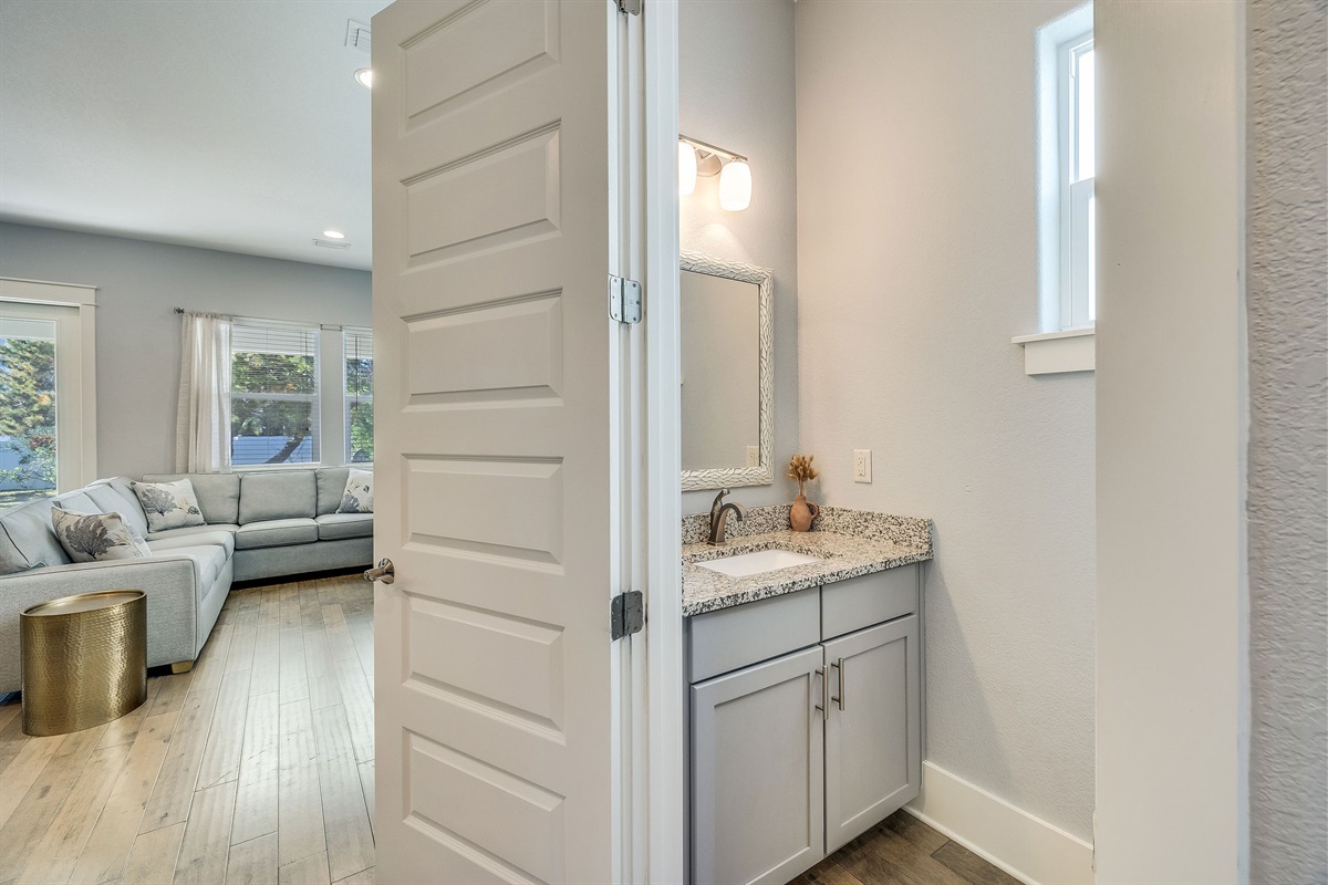 Convenient downstairs half bath located just off the main living area.