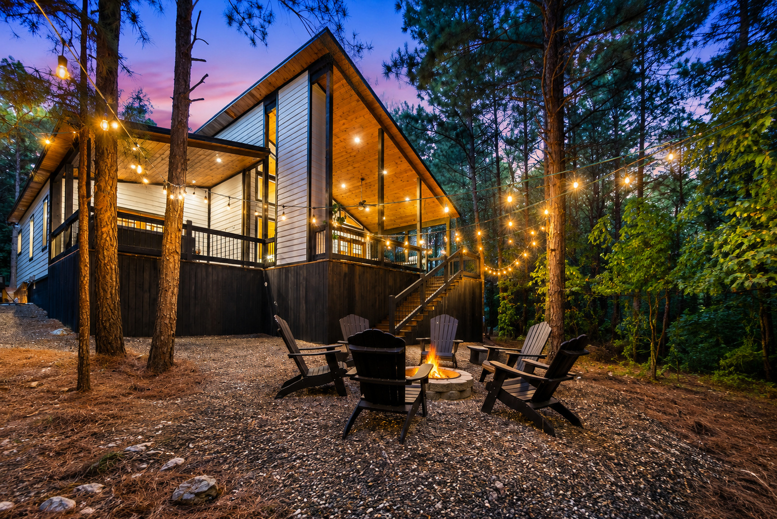 Tucked beneath the pines, Cedar Stillness is your own little forest escape, peaceful, private, and secluded, with glowing string lights and fireside nights waiting just outside.