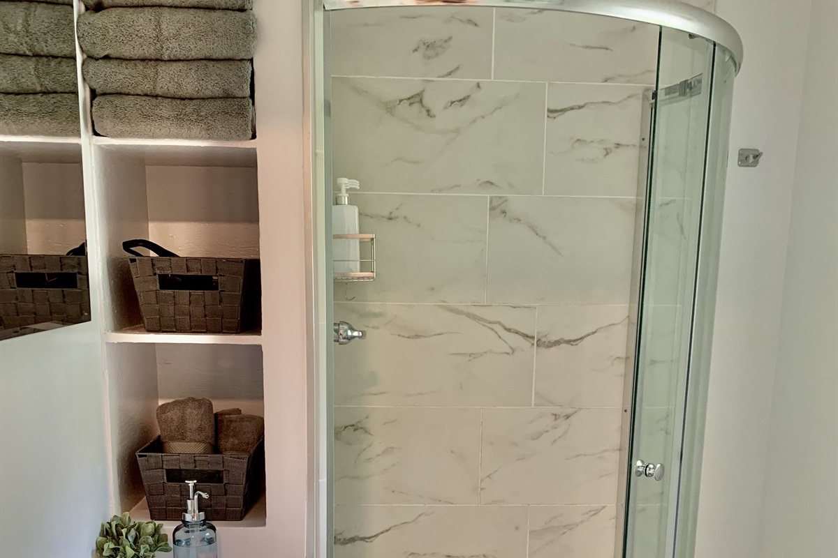 Recently 100% renovated bathroom with new everything! Tiled shower with glass sliding door too!