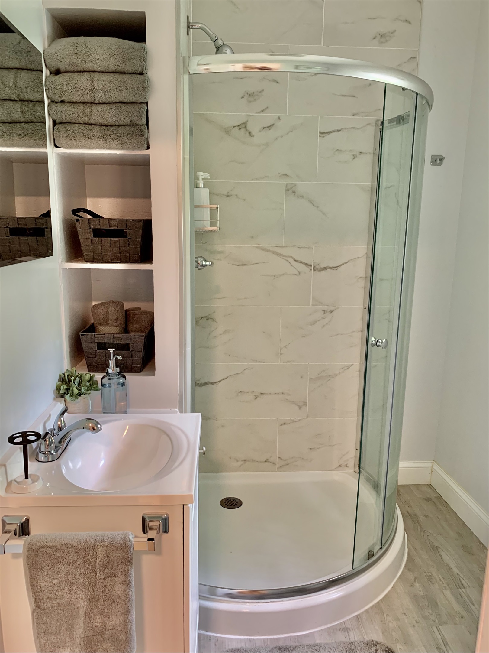 Recently 100% renovated bathroom with new everything! Tiled shower with glass sliding door too!