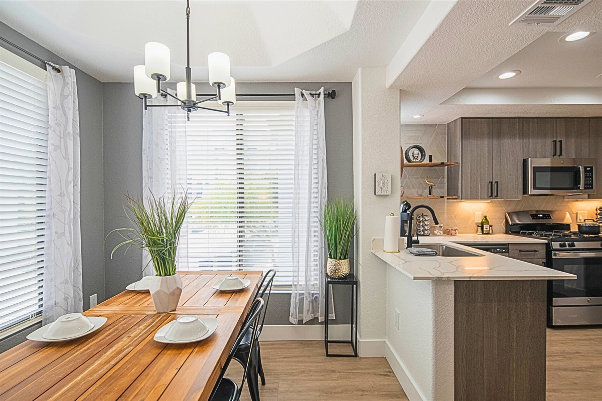 Bright and airy kitchen and dining area perfect for cooking, eating, and making memories.