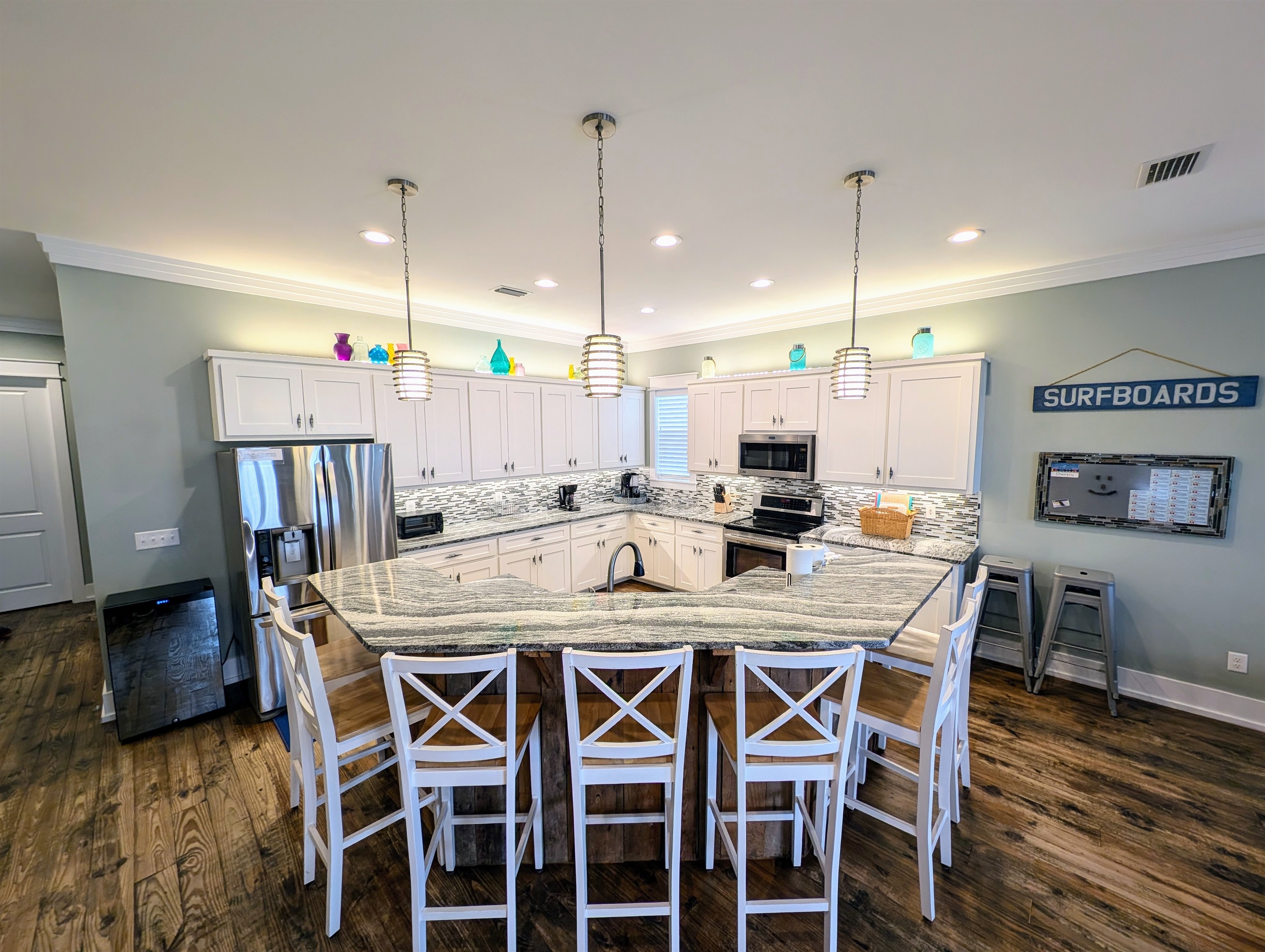 Island offers additional seating totaling dining space for 21 together on just the 2nd level