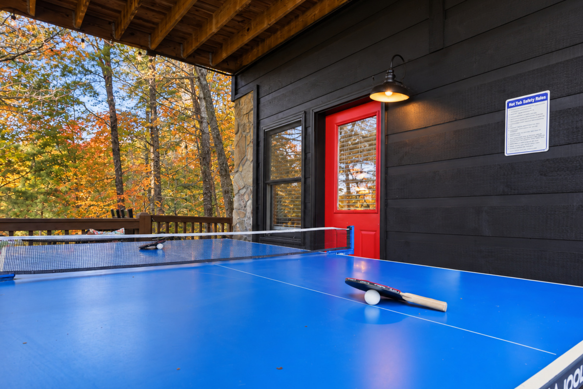 Friendly competition under the mountain sky, ping pong with a view.