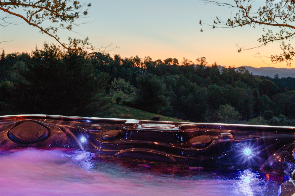 {6- Person Hot Tub}
Soak beneath colorful mountain sunsets from the private hot tub overlooking peaceful Blue Ridge views. The kind of moment you’ll wish you could bottle up and take home.