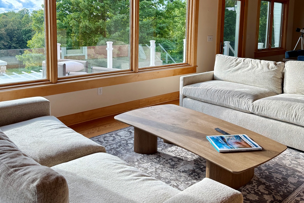 Enjoy a game among friends as you watch the view change before your eyes and catch the Lions game on the 55" Smart TV in the living room.