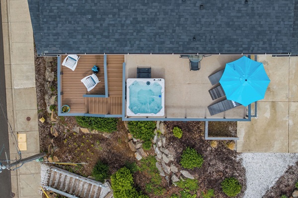 One of the home’s multiple decks includes a private hot tub, lounge seating, and room to entertain. It’s the perfect setting for morning coffee, or sunset soaking, or starry-night conversations.