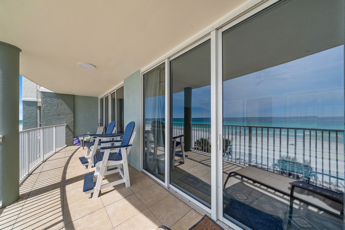 Panoramic balcony spans the bedroom and living room