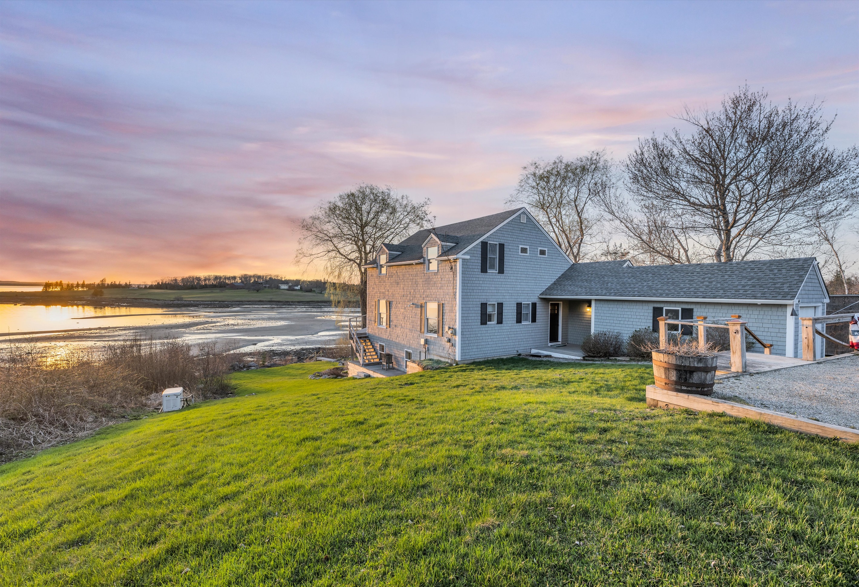 Sunset and left side of the house and lakeview