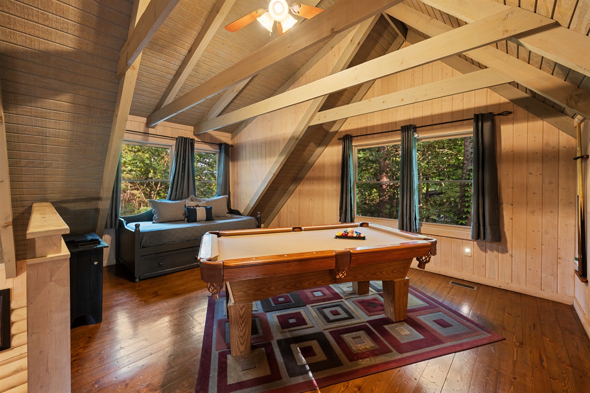 Loft game room fun: Pool table, trundle bed & mountain views await!