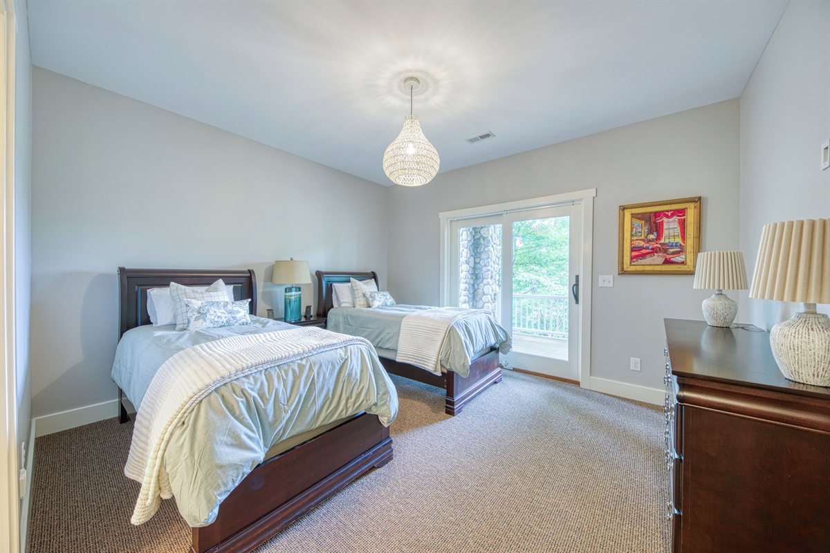 Lower Level Double Twin Bedroom With Lake Views And Deck Access