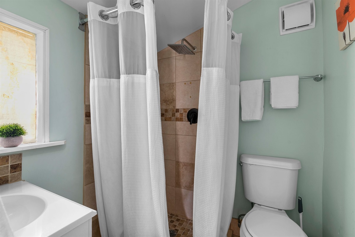 Refresh and reset in a clean, walk-in shower designed for easy comfort.