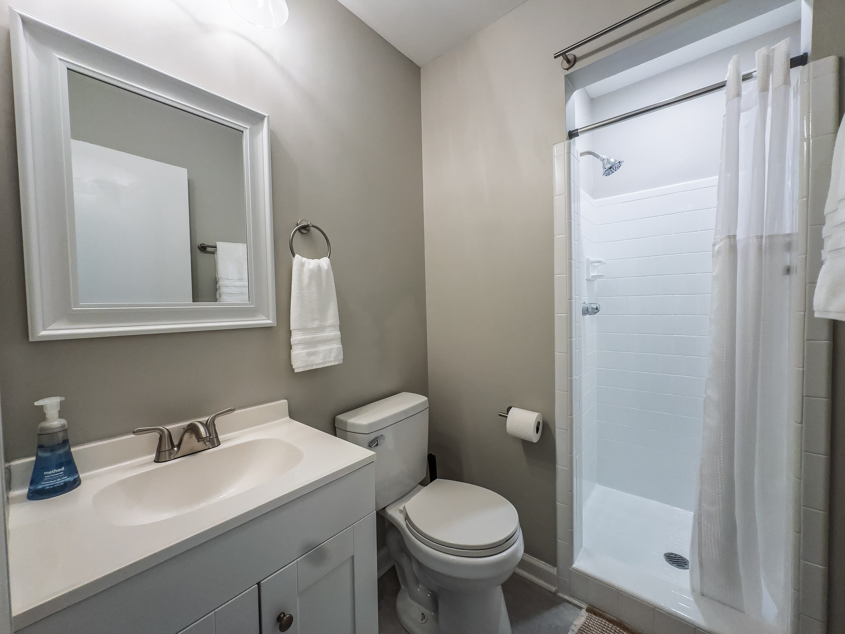 Private full bathroom at primary bedroom, walk in shower.