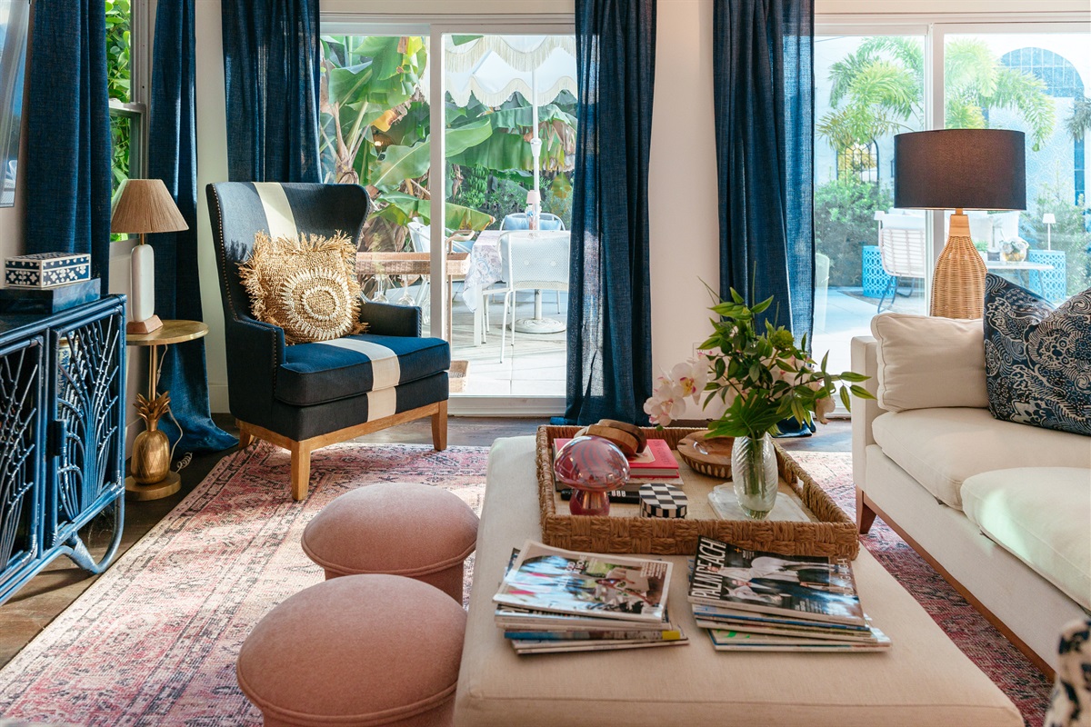 Adjacent to the bar and dining area is the living room, where you can unwind on our comfortable seating.