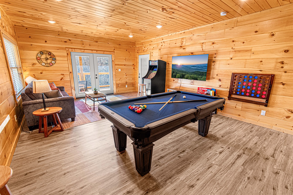 The game room is the perfect spot for socializing, gaming, and relaxation.Family game night or a match with friends, the pool table is a hit every time!