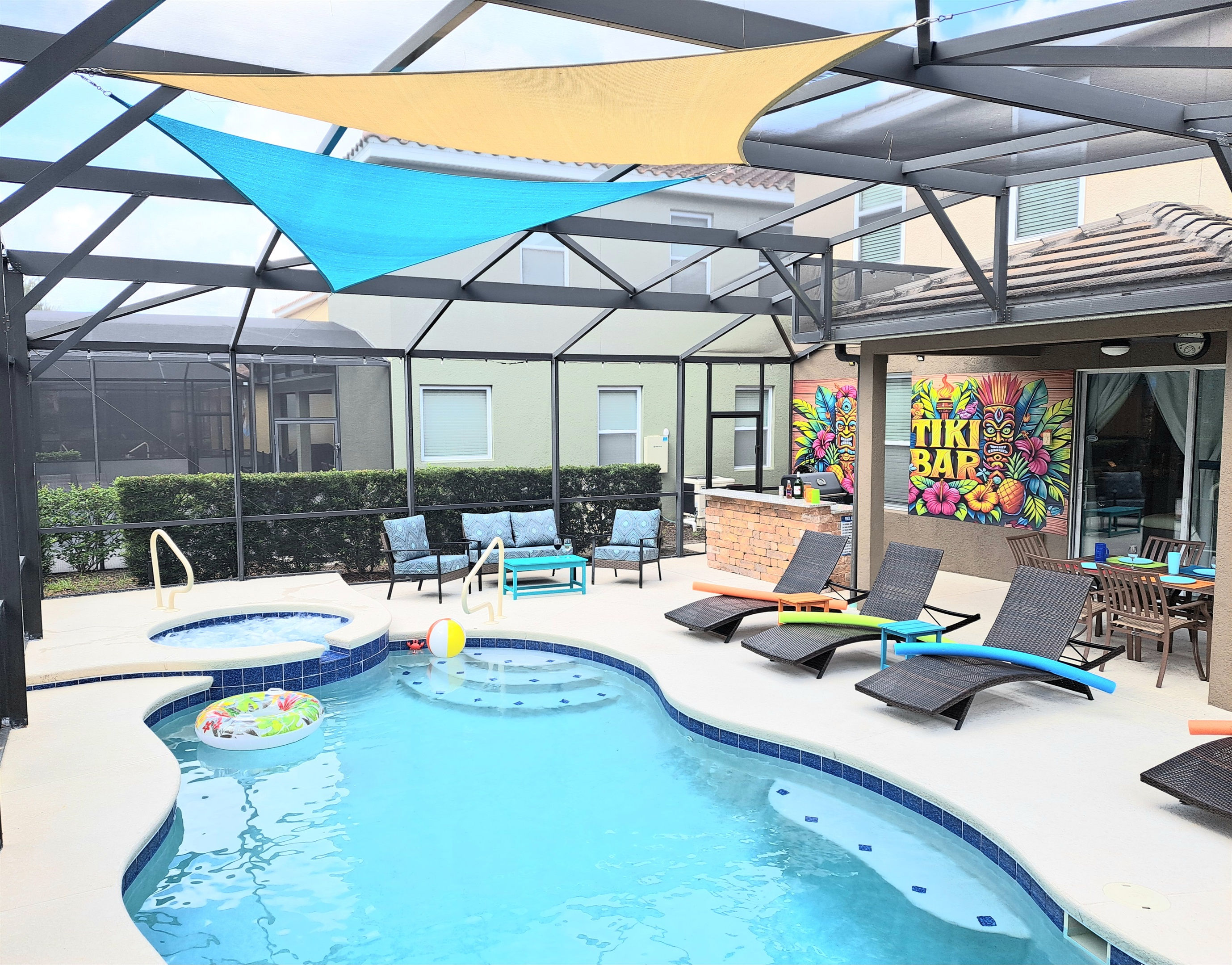 Sails over the pool provide an optional retreat from the sun when you're in the pool.