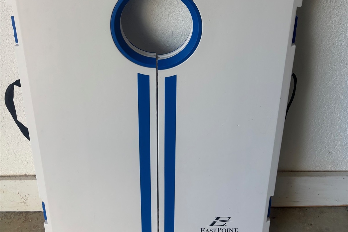 Cornhole located in the garage.