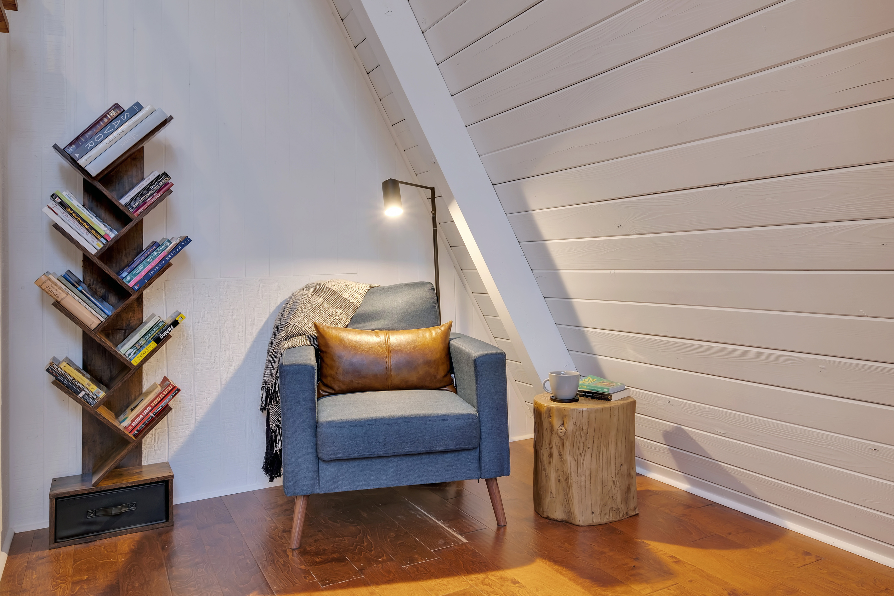 Reading nook with bookshelf and armchair