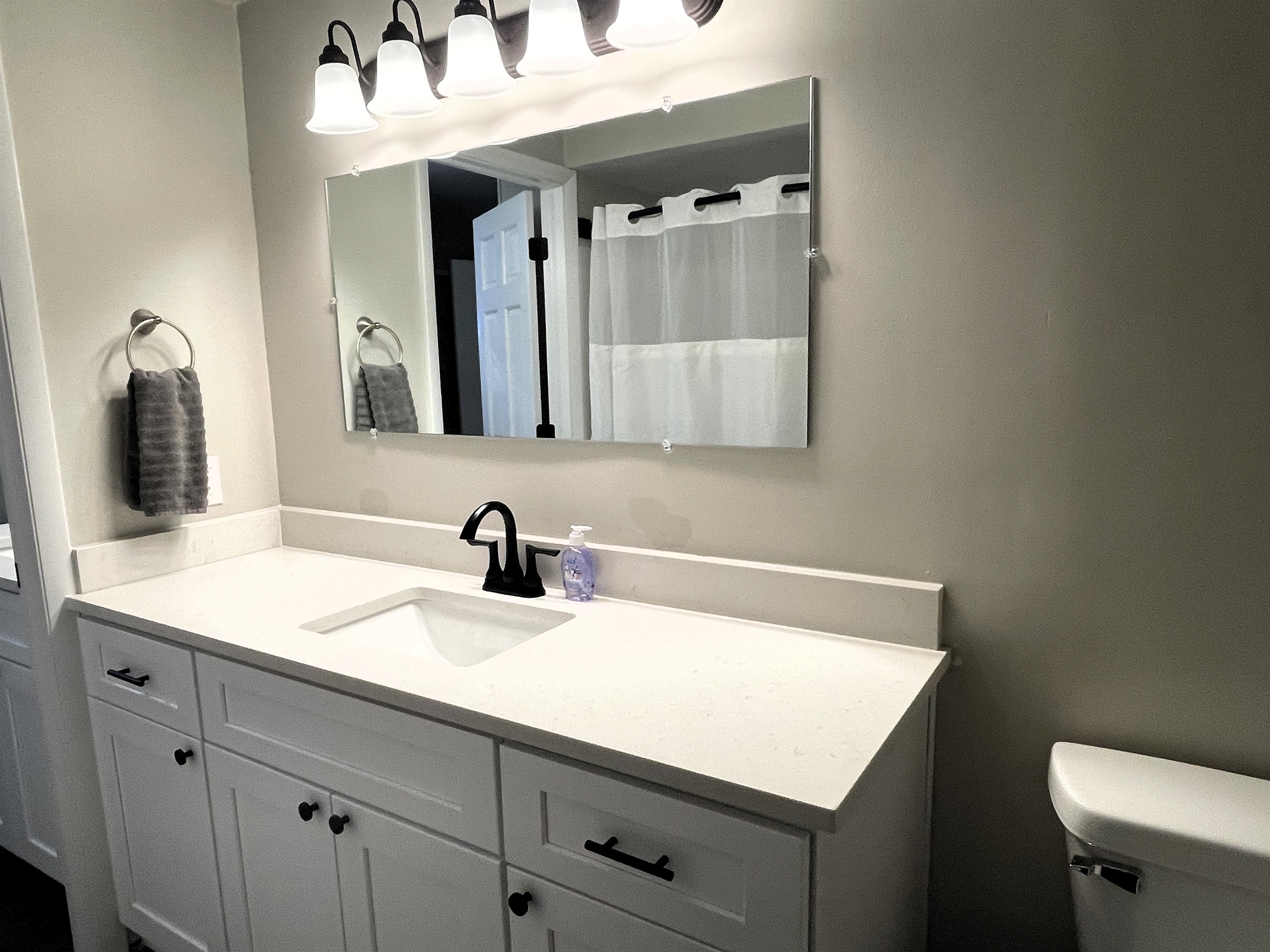 Full bath with full size tub/shower combo