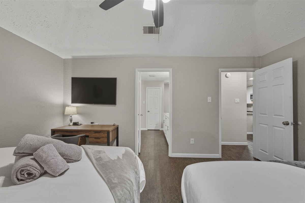 Perfect for families or business travelers — 2 queens + work desk.