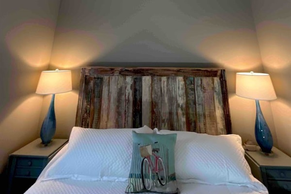 Bedroom 1 - high ceilings with fans.