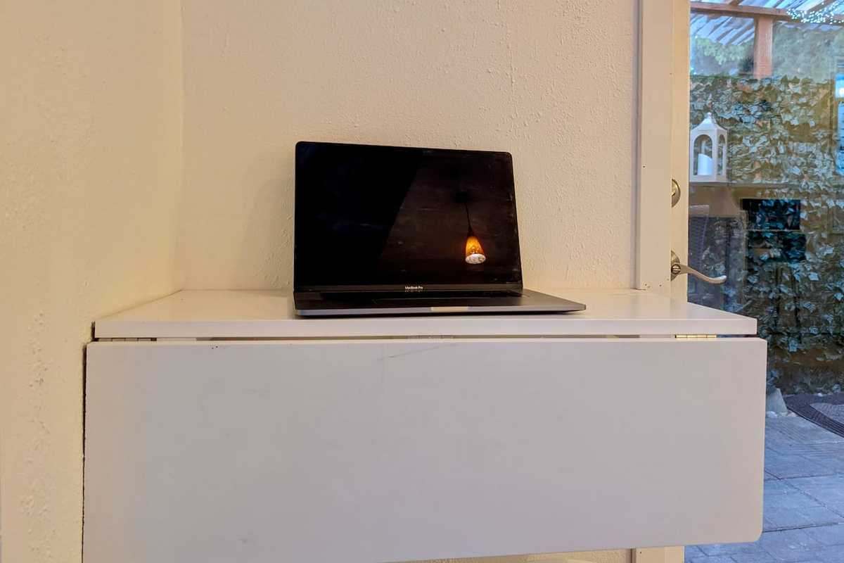 Fold-down desk for work or study.