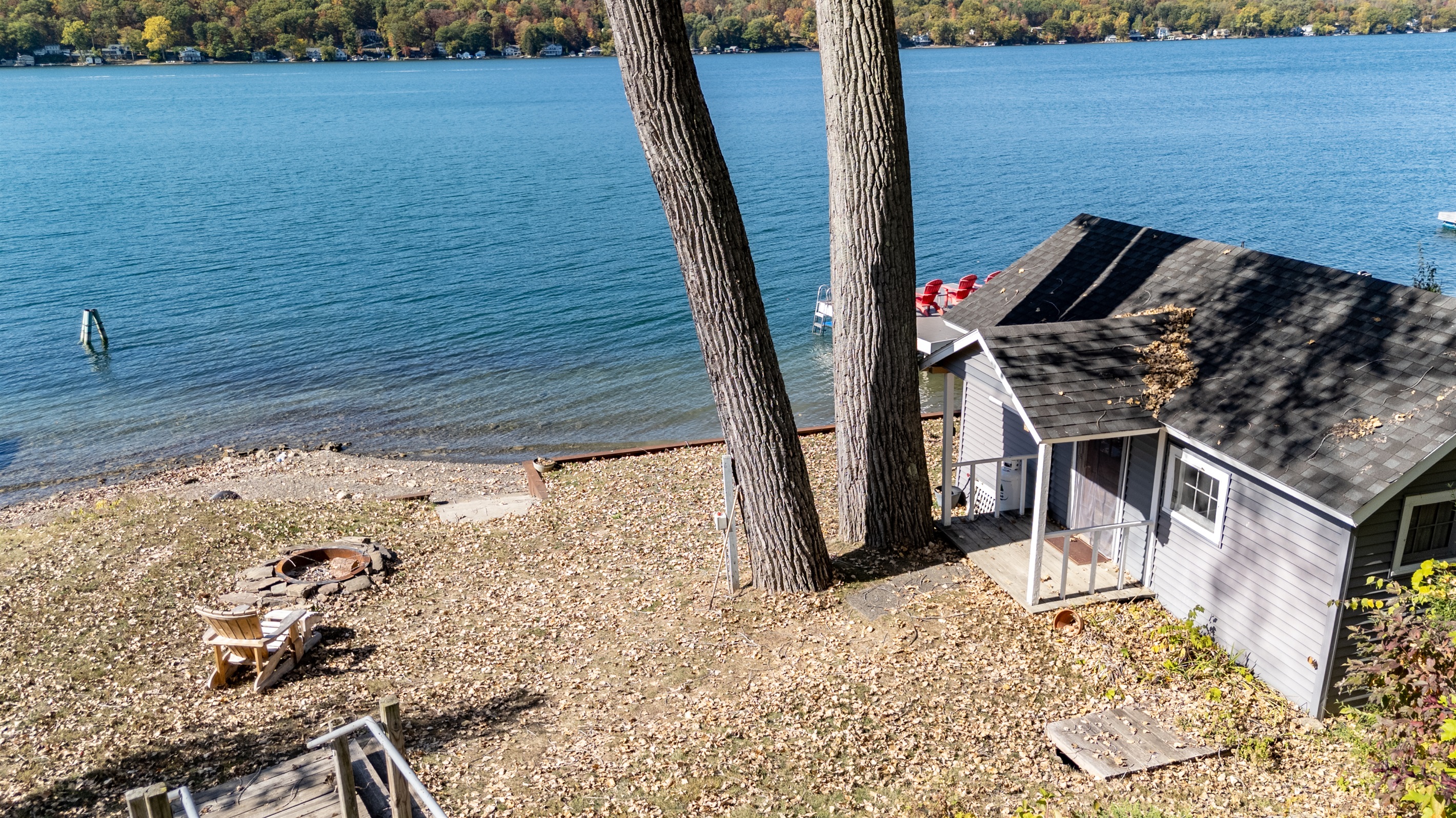 Private lake access with a cozy boathouse and pebble beach — your own slice of lakeside paradise.