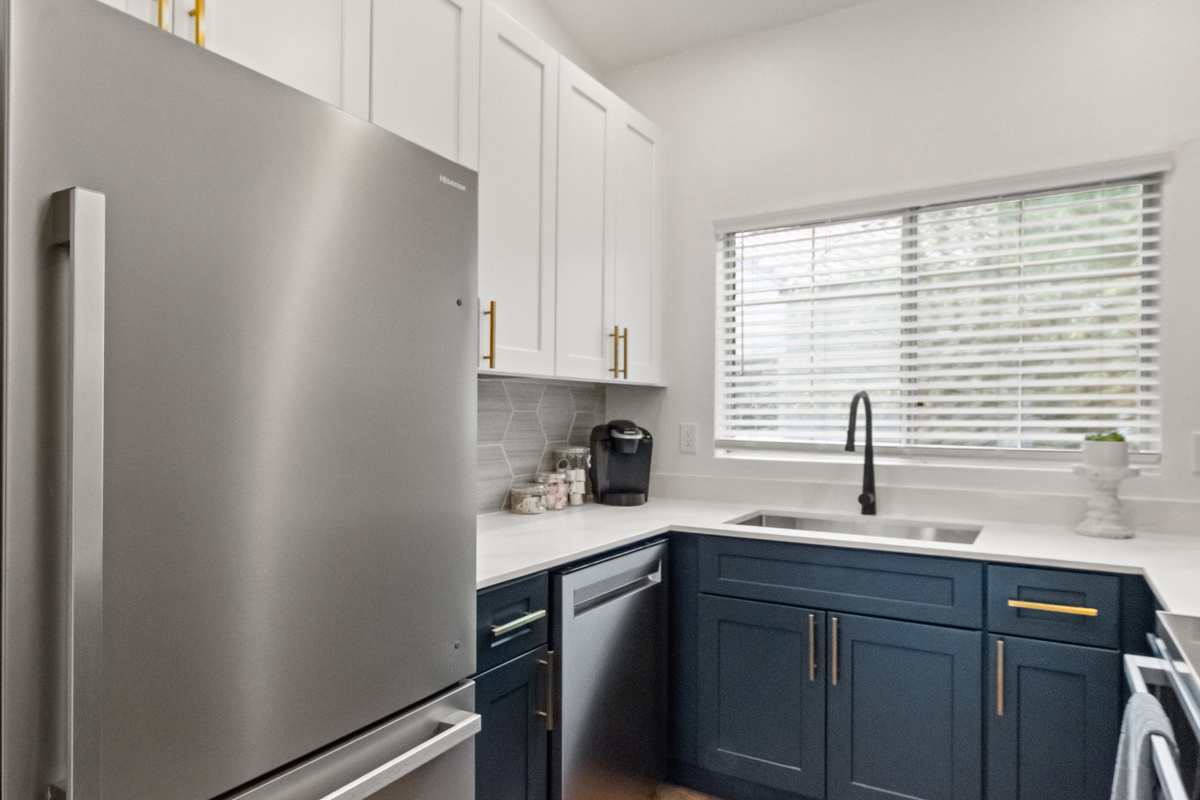 Bright kitchen with natural light and modern cooking conveniences.
